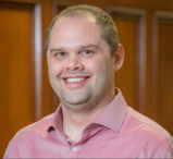 A portrait of Alex Goddard