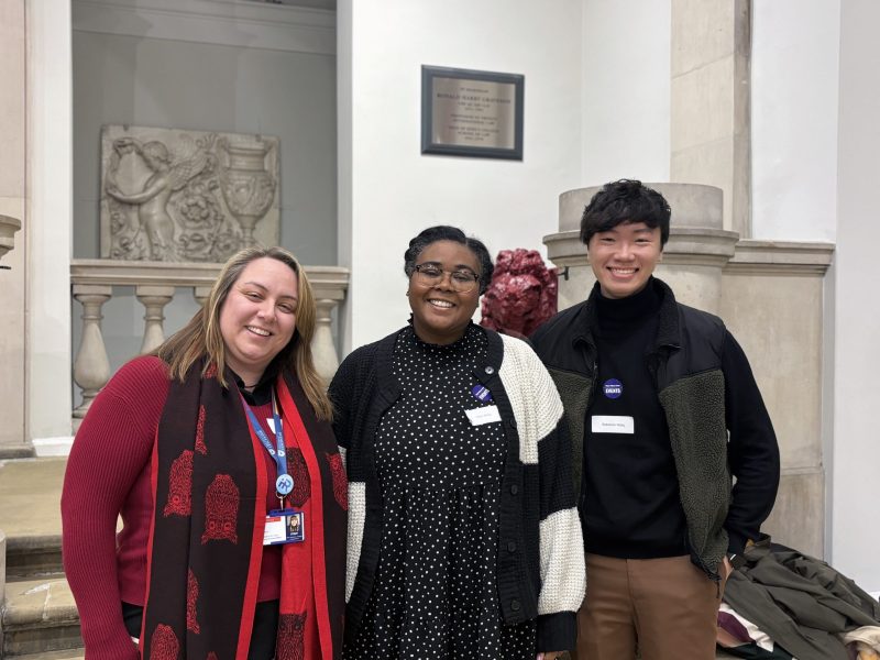 (left) Fi Wood, (Middle) Cleo White, and (right) Sebastian Wang standing together at the KCL symposium